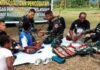 KUNJUNGI KP.GIMBIS PAPUA PEGUNUNGAN, SATGAS TNI BERIKAN LAYANAN KESEHATAN GRATIS